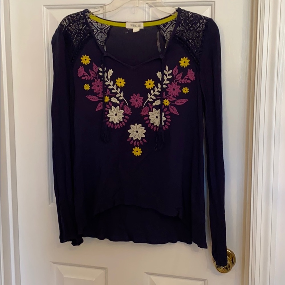 Navy top with floral design